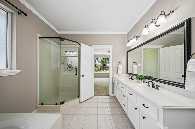 2452 Ripplewood Dr, Conroe, TX 77384 - full bath with double vanity, tile patterned flooring, a shower stall, and ornamental molding