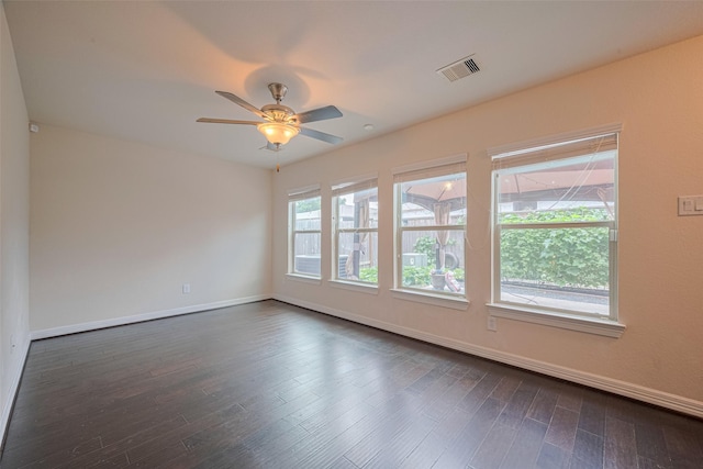 10004 Spring Shadows Park Cir, Houston, TX 77080 - empty room featuring dark wood finished floors and ceiling fan