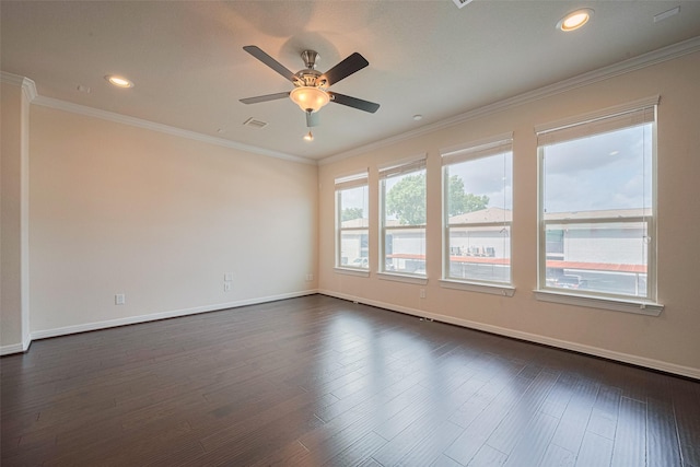 10004 Spring Shadows Park Cir, Houston, TX 77080 - spare room featuring a ceiling fan, dark wood-type flooring, recessed lighting, and crown molding