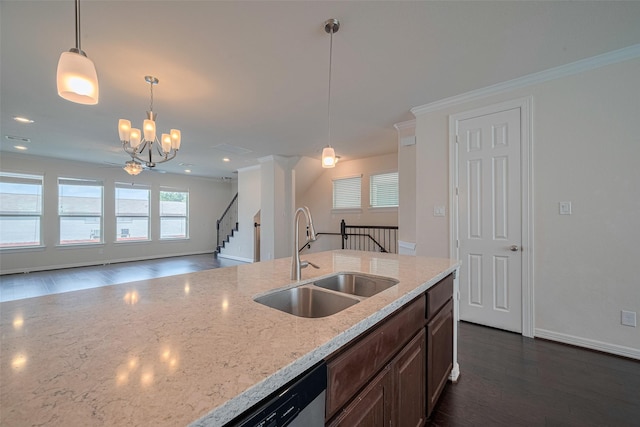 10004 Spring Shadows Park Cir, Houston, TX 77080 - kitchen with a chandelier, dark wood-type flooring, light stone counters, hanging light fixtures, and open floor plan