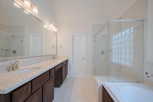 10004 Spring Shadows Park Cir, Houston, TX 77080 - full bath with double vanity, a stall shower, a garden tub, lofted ceiling, and tile patterned floors