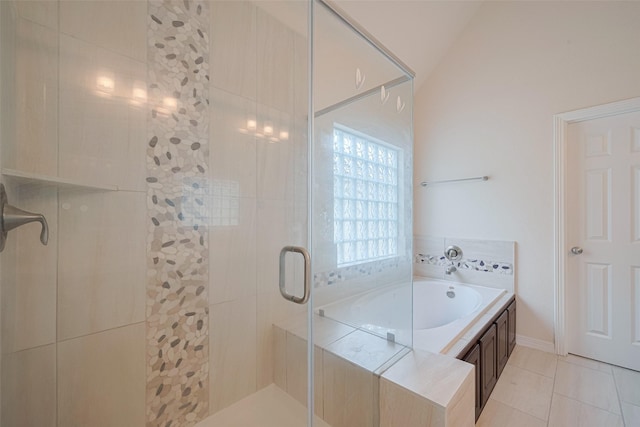 10004 Spring Shadows Park Cir, Houston, TX 77080 - bathroom featuring a stall shower, a garden tub, and tile patterned flooring