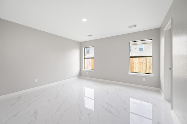 18935 Remington Bend Dr, Houston, TX 77073 - unfurnished room featuring light marble finish floors and baseboards