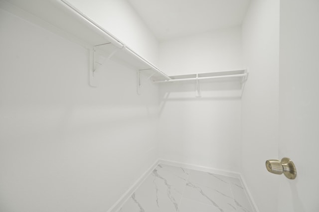 18935 Remington Bend Dr, Houston, TX 77073 - spacious closet with light marble finish floors