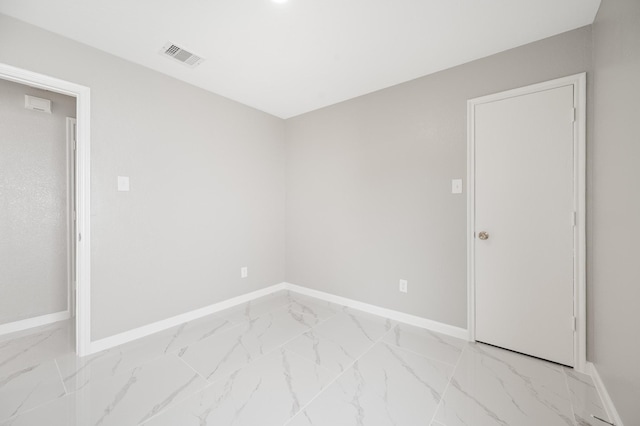 18935 Remington Bend Dr, Houston, TX 77073 - spare room with baseboards and light marble finish flooring