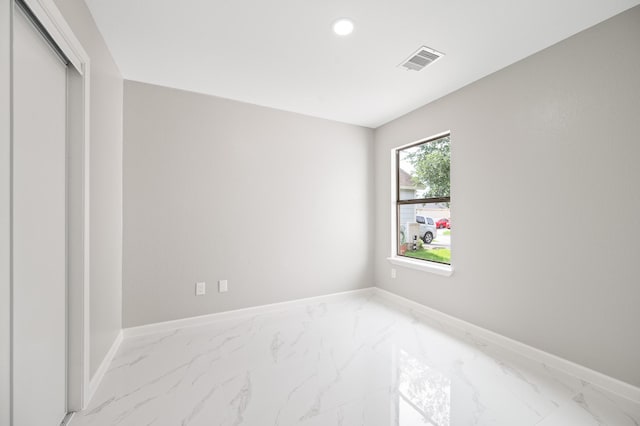 18935 Remington Bend Dr, Houston, TX 77073 - unfurnished room with marble finish floors and recessed lighting