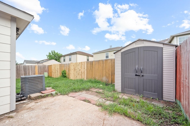18935 Remington Bend Dr, Houston, TX 77073 - fenced backyard featuring a storage shed and a patio
