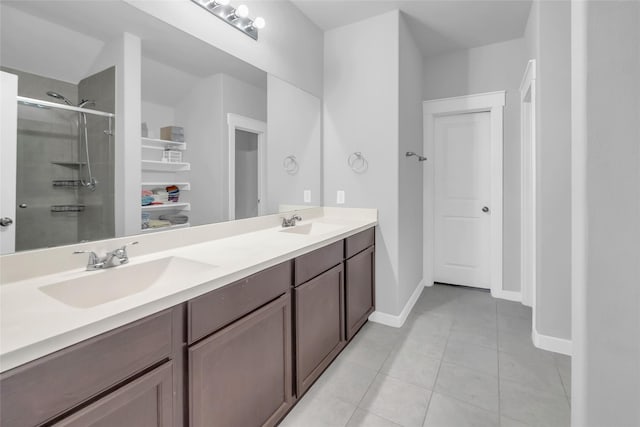 12326 Sabine Point Dr, Humble, TX 77346 - full bath with double vanity, a shower stall, tile patterned floors, and a closet