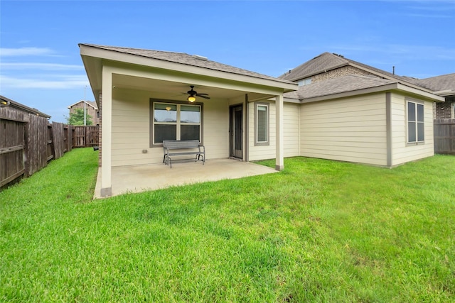 12326 Sabine Point Dr, Humble, TX 77346 - back of house with a ceiling fan, a fenced backyard, a patio, and a shingled roof
