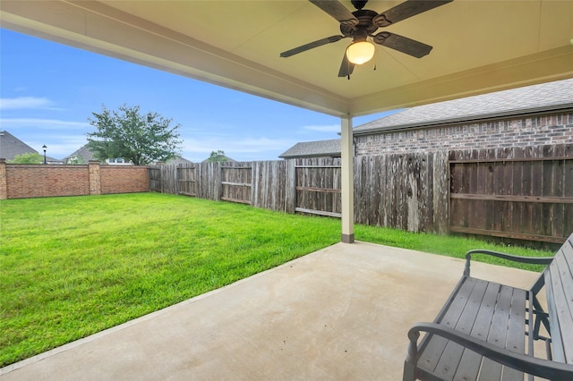 12326 Sabine Point Dr, Humble, TX 77346 - fenced backyard with ceiling fan and a patio