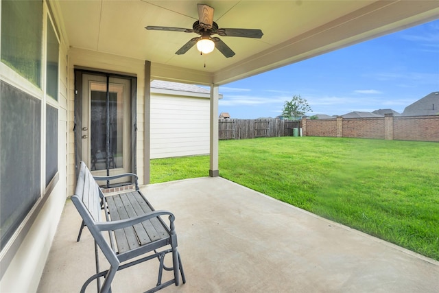 12326 Sabine Point Dr, Humble, TX 77346 - fenced backyard featuring a patio area and a ceiling fan