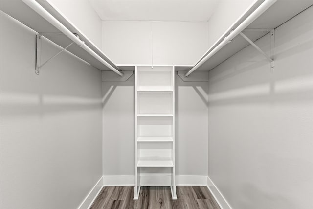 2501 Marilee Ln Unit 4, Houston, TX 77057 - walk in closet featuring dark wood-style floors