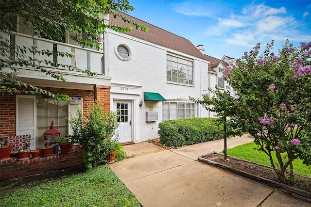 2501 Marilee Ln Unit 4, Houston, TX 77057 - view of front of property featuring a balcony and brick siding