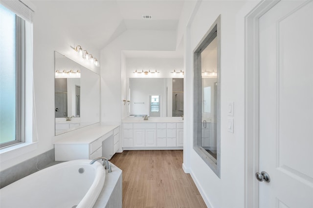 30218 Indigo Falls Dr, Brookshire, TX 77423 - bathroom with a bath, vanity, a stall shower, healthy amount of natural light, and lofted ceiling