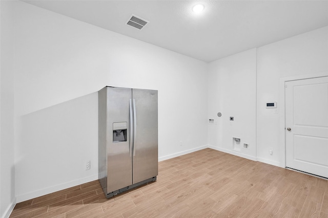 30218 Indigo Falls Dr, Brookshire, TX 77423 - washroom featuring electric dryer hookup, light wood-style flooring, and recessed lighting