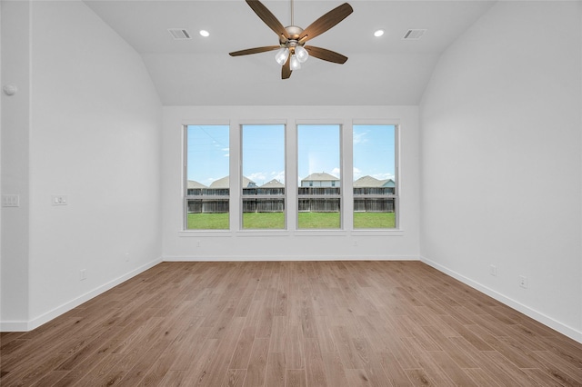 30218 Indigo Falls Dr, Brookshire, TX 77423 - unfurnished room featuring vaulted ceiling, plenty of natural light, ceiling fan, wood finished floors, and recessed lighting