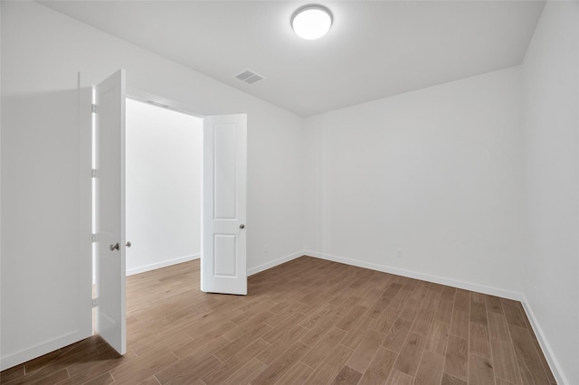 30218 Indigo Falls Dr, Brookshire, TX 77423 - spare room with wood finished floors