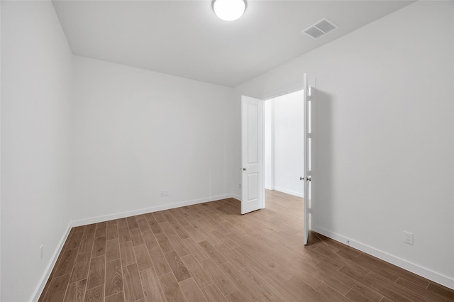 30218 Indigo Falls Dr, Brookshire, TX 77423 - empty room featuring wood finished floors and baseboards