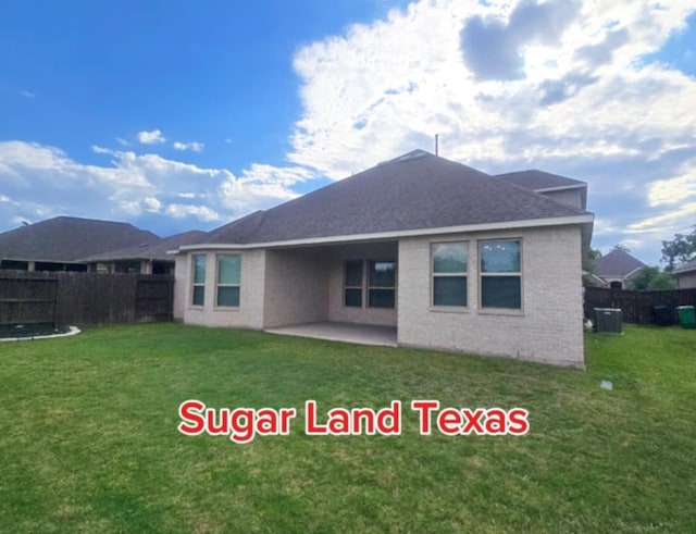 5715 Caper Shores Ln, Sugar Land, TX 77479 - back of house featuring a patio