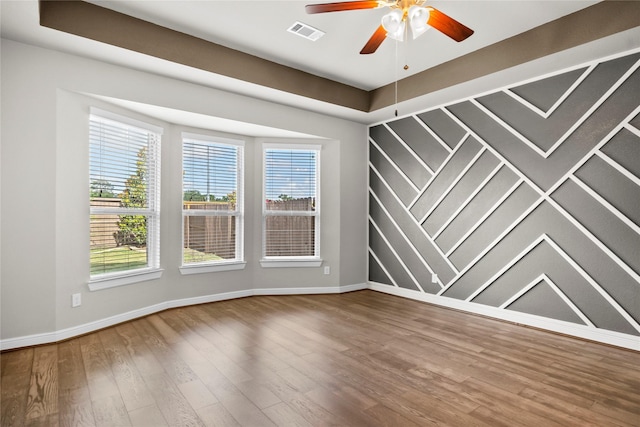 5715 Caper Shores Ln, Sugar Land, TX 77479 - unfurnished room featuring wood finished floors and a ceiling fan