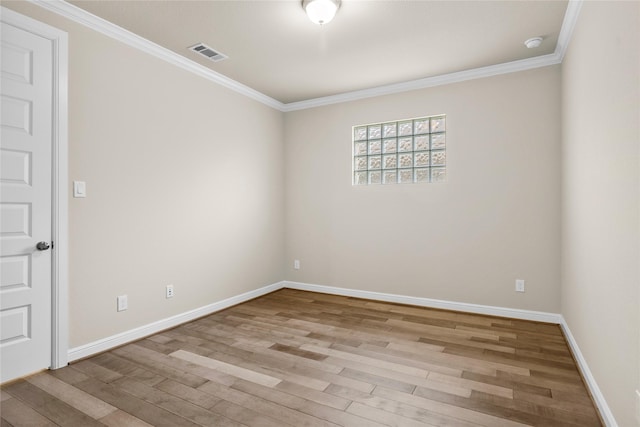 5715 Caper Shores Ln, Sugar Land, TX 77479 - unfurnished room with wood finished floors, ornamental molding, and a smoke detector