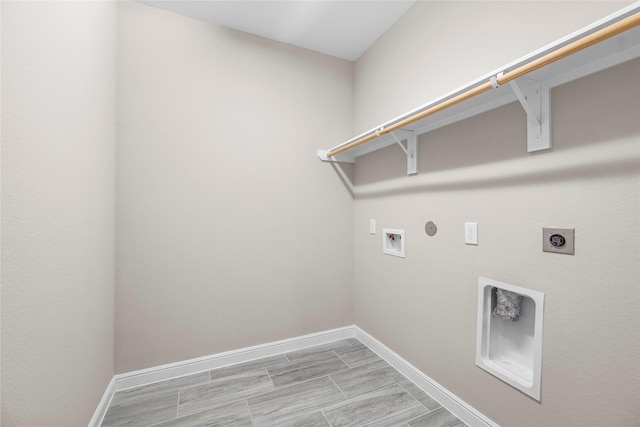 5715 Caper Shores Ln, Sugar Land, TX 77479 - laundry room with electric dryer hookup, washer hookup, and hookup for a gas dryer
