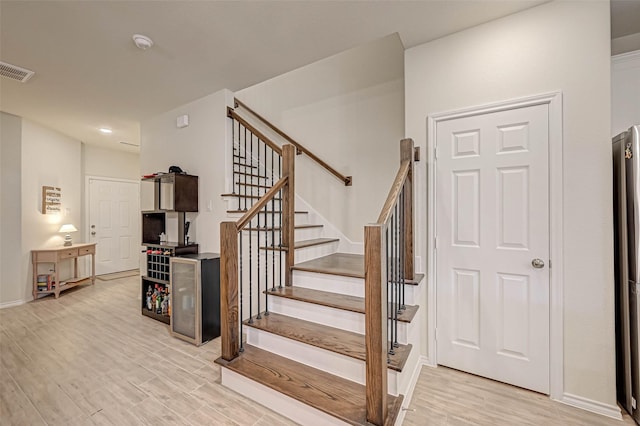 3226 Longleaf Meadows Dr, Houston, TX 77063 - staircase featuring wood finished floors and baseboards