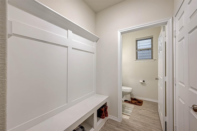 3226 Longleaf Meadows Dr, Houston, TX 77063 - mudroom featuring baseboards and light wood finished floors