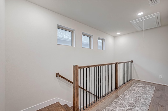 3226 Longleaf Meadows Dr, Houston, TX 77063 - stairs featuring attic access and wood finished floors