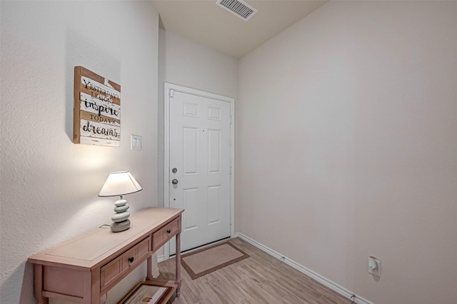 3226 Longleaf Meadows Dr, Houston, TX 77063 - doorway with light wood finished floors and baseboards