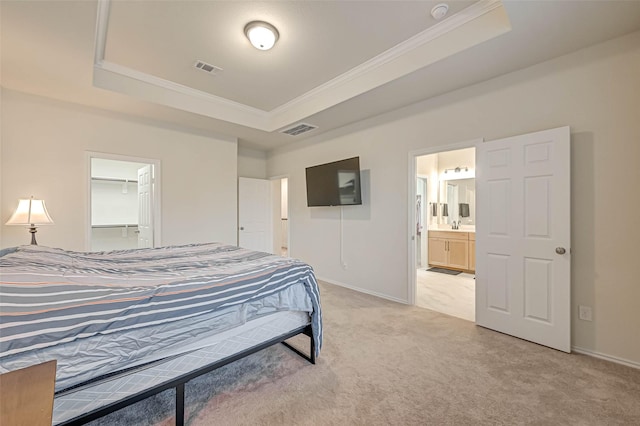 3226 Longleaf Meadows Dr, Houston, TX 77063 - bedroom featuring a tray ceiling, light carpet, crown molding, connected bathroom, and a closet