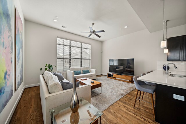 3929 Tulane Oak Dr, Houston, TX 77018 - living room featuring wood finished floors, a ceiling fan, and recessed lighting