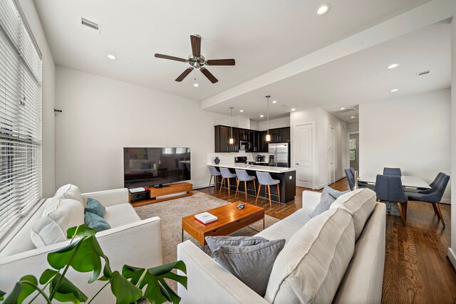 3929 Tulane Oak Dr, Houston, TX 77018 - living room featuring dark wood-style floors, ceiling fan, and recessed lighting