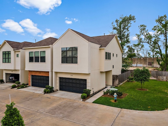 3929 Tulane Oak Dr, Houston, TX 77018 - view of front of home featuring a shingled roof, concrete driveway, and an attached garage
