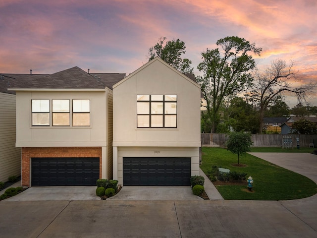 3929 Tulane Oak Dr, Houston, TX 77018 - contemporary home with driveway, a garage, and stucco siding