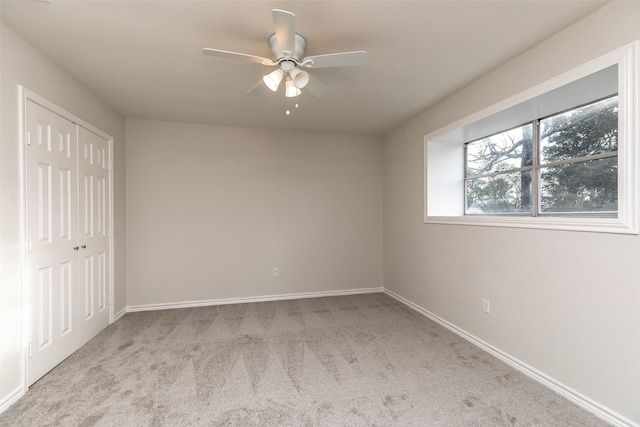 12707 Pleasant Grove Rd, Cypress, TX 77429 - unfurnished bedroom with carpet floors, a closet, and ceiling fan