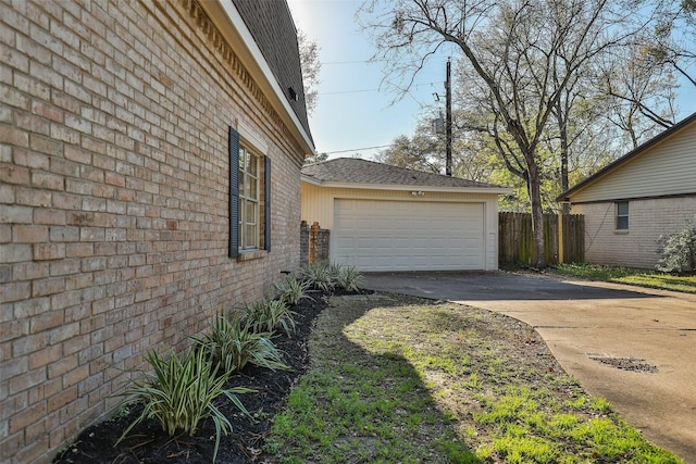 12707 Pleasant Grove Rd, Cypress, TX 77429 - view of home's exterior with brick siding and a garage