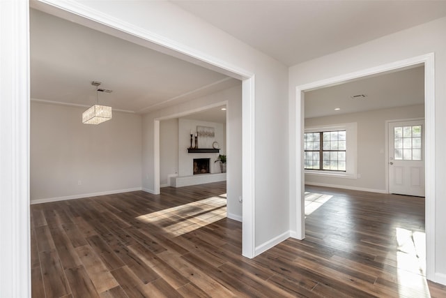 12707 Pleasant Grove Rd, Cypress, TX 77429 - corridor featuring dark wood finished floors and baseboards