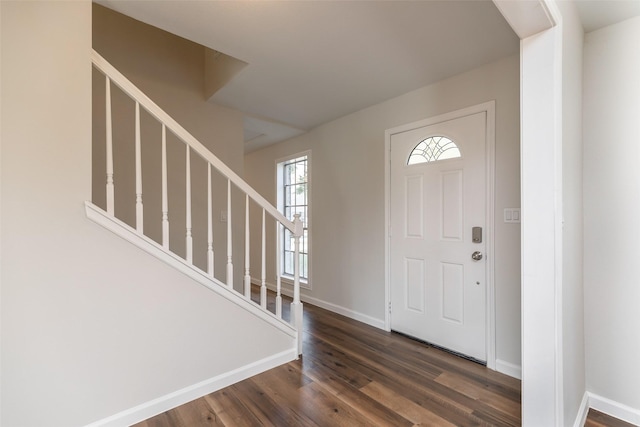 12707 Pleasant Grove Rd, Cypress, TX 77429 - entryway featuring dark wood finished floors and stairs