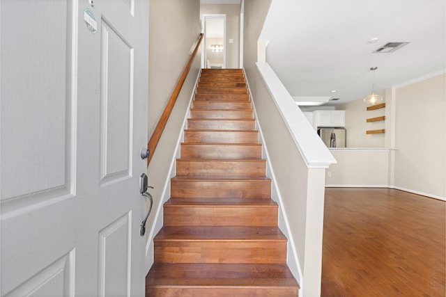 1708 Dennis St, Houston, TX 77004 - stairs with wood finished floors