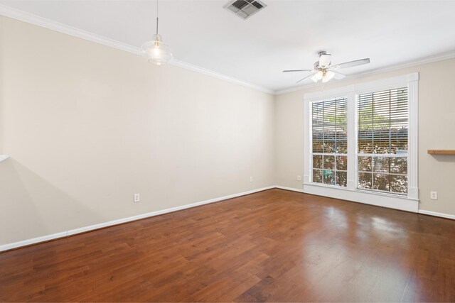 1708 Dennis St, Houston, TX 77004 - spare room with ceiling fan, wood finished floors, and ornamental molding