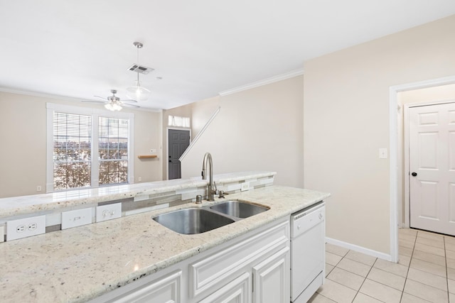 1708 Dennis St, Houston, TX 77004 - kitchen featuring dishwasher, ornamental molding, light tile patterned flooring, hanging light fixtures, and white cabinets