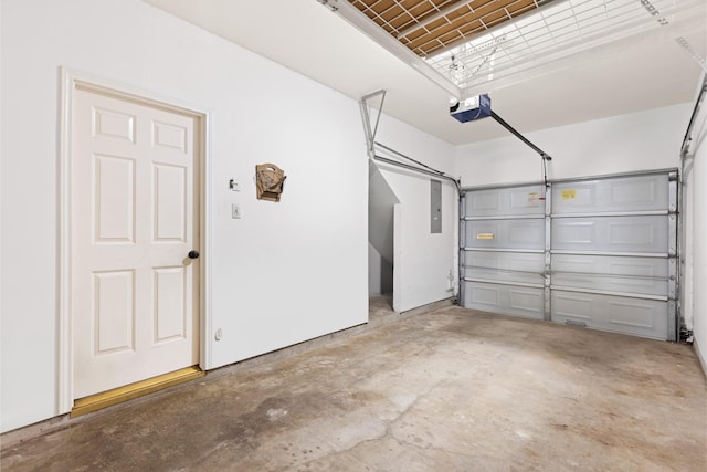 1708 Dennis St, Houston, TX 77004 - garage featuring a garage door opener and electric panel