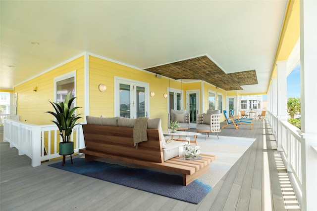 20611 E Sunset Bay Dr, Galveston, TX 77554 - wooden deck featuring outdoor lounge area