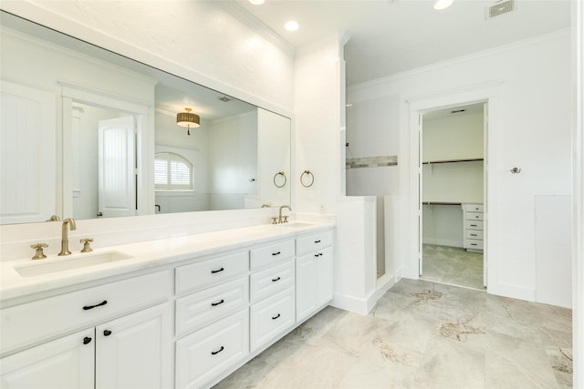 20611 E Sunset Bay Dr, Galveston, TX 77554 - full bath featuring ornamental molding, double vanity, a stall shower, marble finish flooring, and a walk in closet