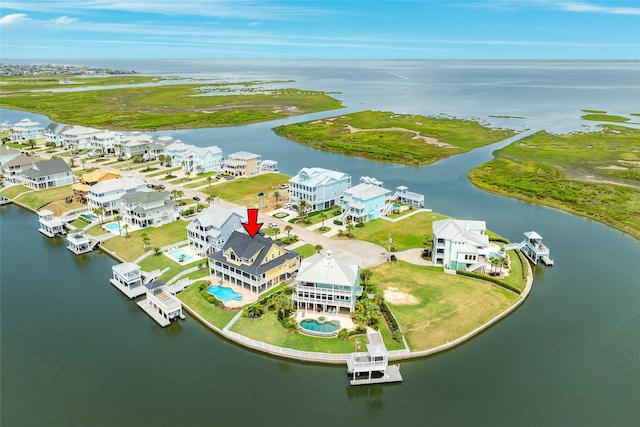 20611 E Sunset Bay Dr, Galveston, TX 77554 - bird's eye view of a nearby body of water and a pool area