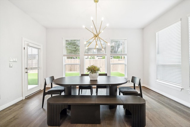 1120 Wakefield Dr, Houston, TX 77018 - dining room with a chandelier, plenty of natural light, and dark wood-style flooring
