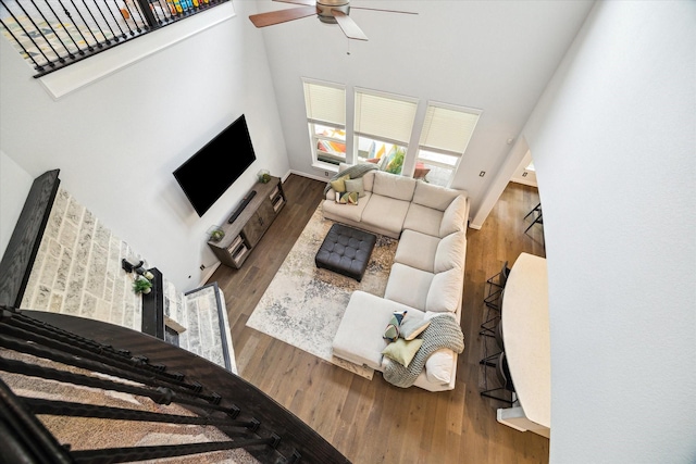 1120 Wakefield Dr, Houston, TX 77018 - living room with a high ceiling, a ceiling fan, and wood finished floors