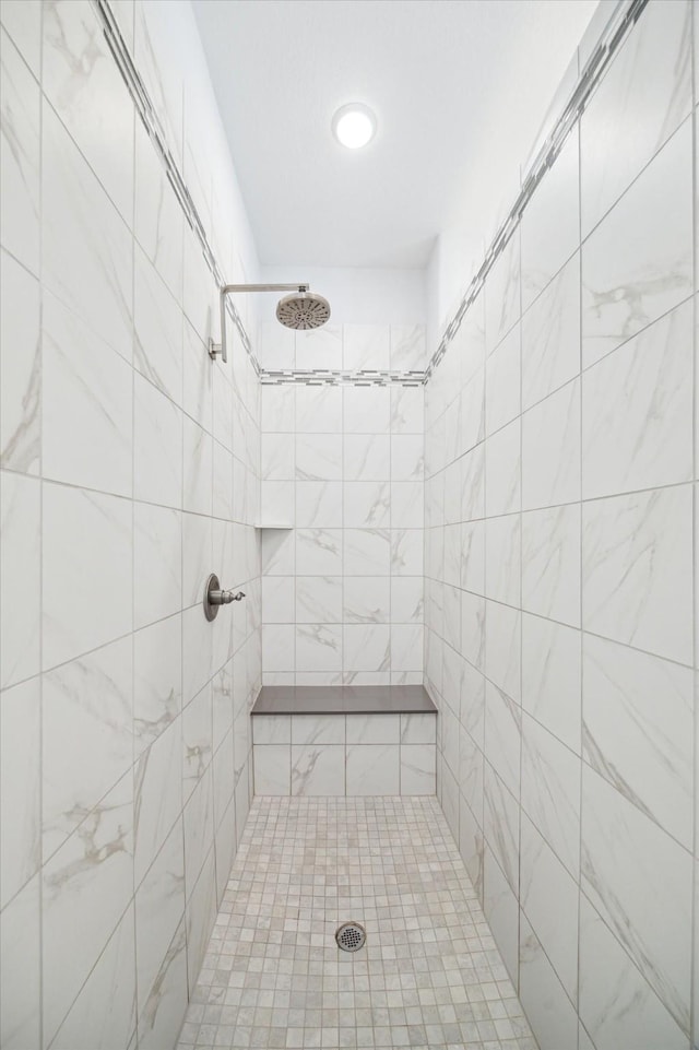 1120 Wakefield Dr, Houston, TX 77018 - bathroom featuring a tile shower