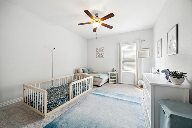 1120 Wakefield Dr, Houston, TX 77018 - bedroom featuring carpet floors, a crib, and a ceiling fan